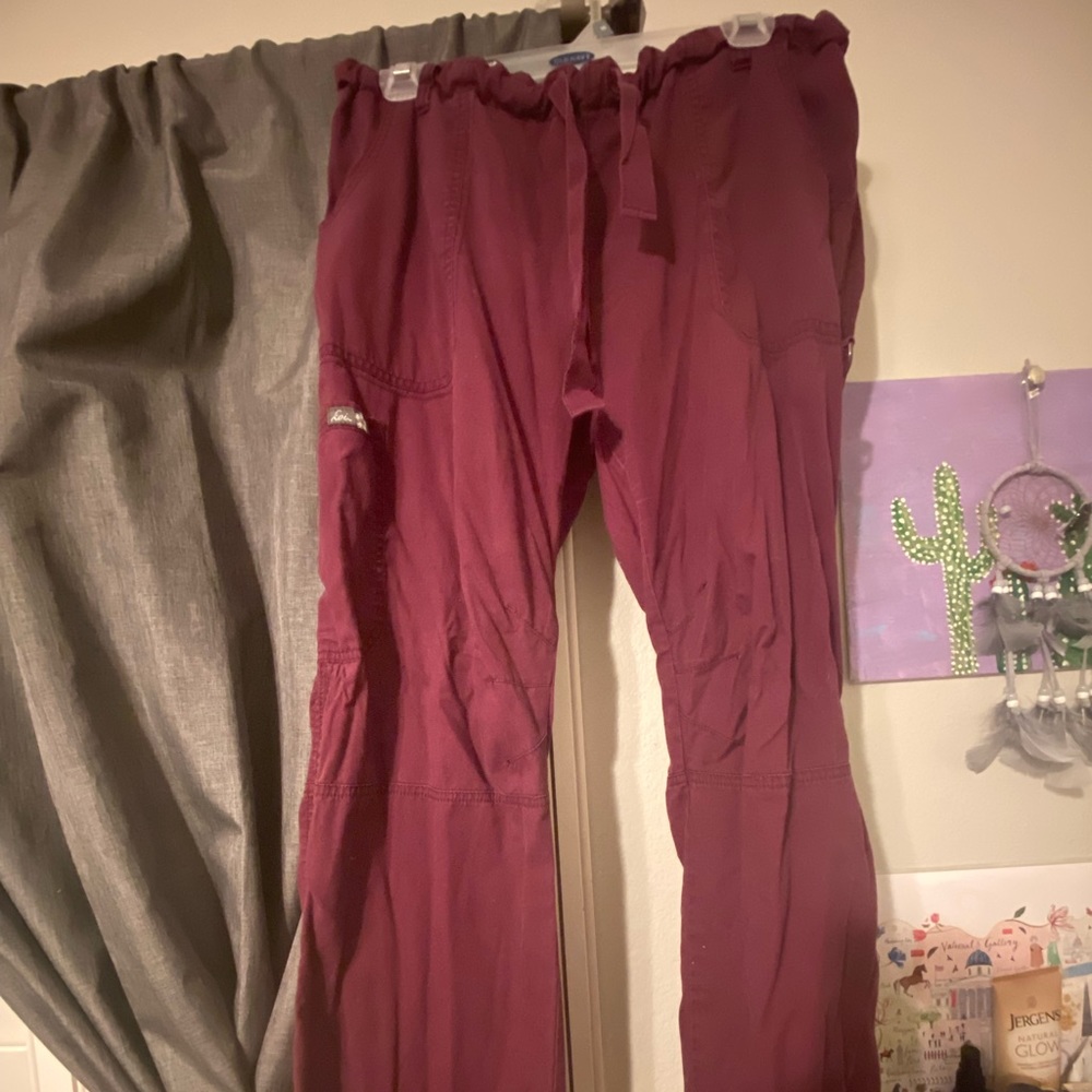Koi slim mid rise cargo pocket scrub pant in size Large. Color: Wine